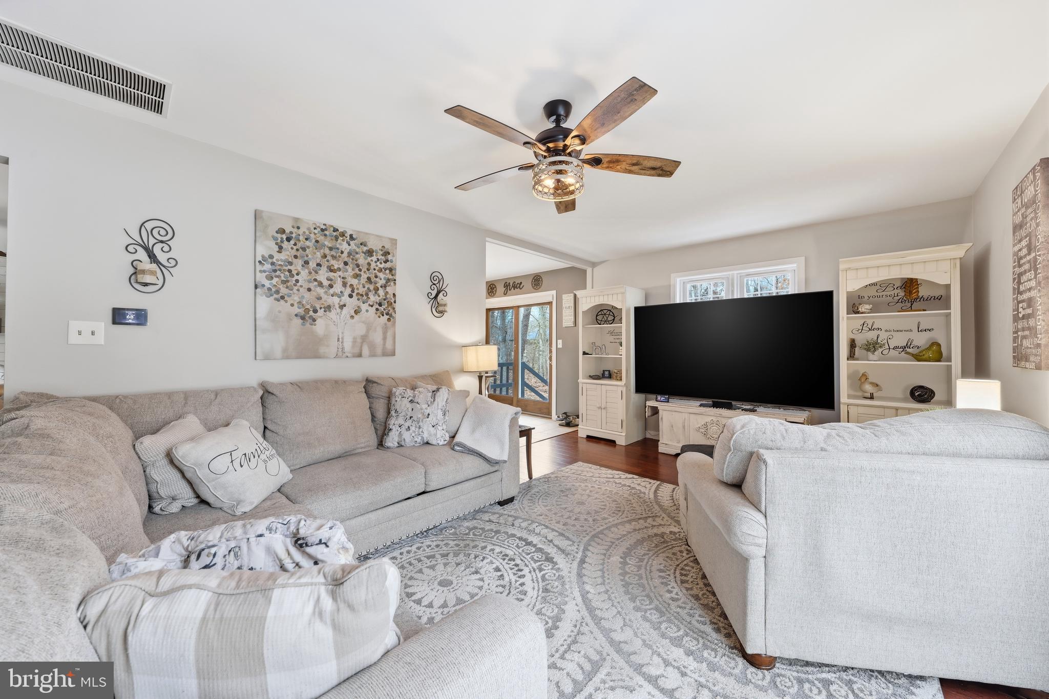 4 Prosit Lane Ocean View, NJ 08230 - Photo 18 of 29 a living room with furniture and a flat screen tv