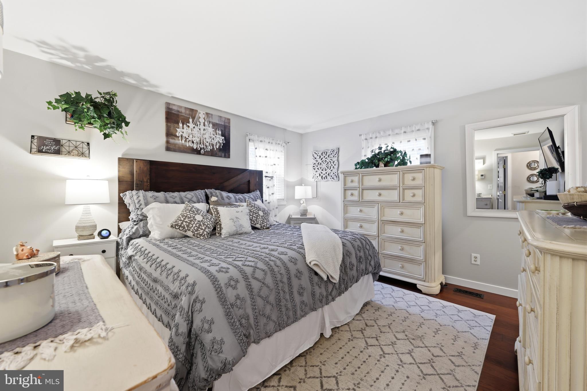 4 Prosit Lane Ocean View, NJ 08230 - Photo 19 of 29 a bedroom with a bed and a view of kitchen