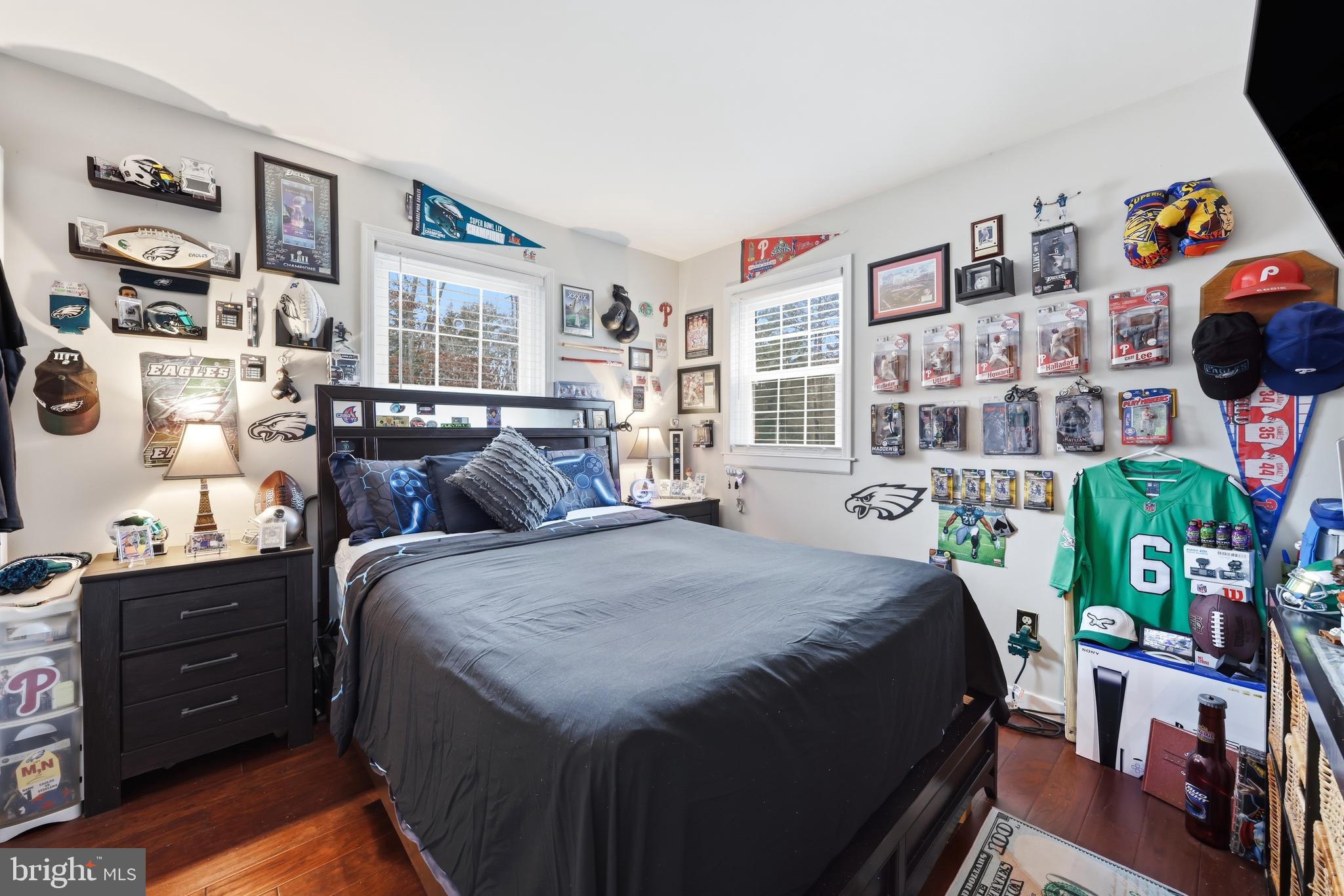 4 Prosit Lane Ocean View, NJ 08230 - Photo 22 of 29 a bedroom with a bed and wooden floor