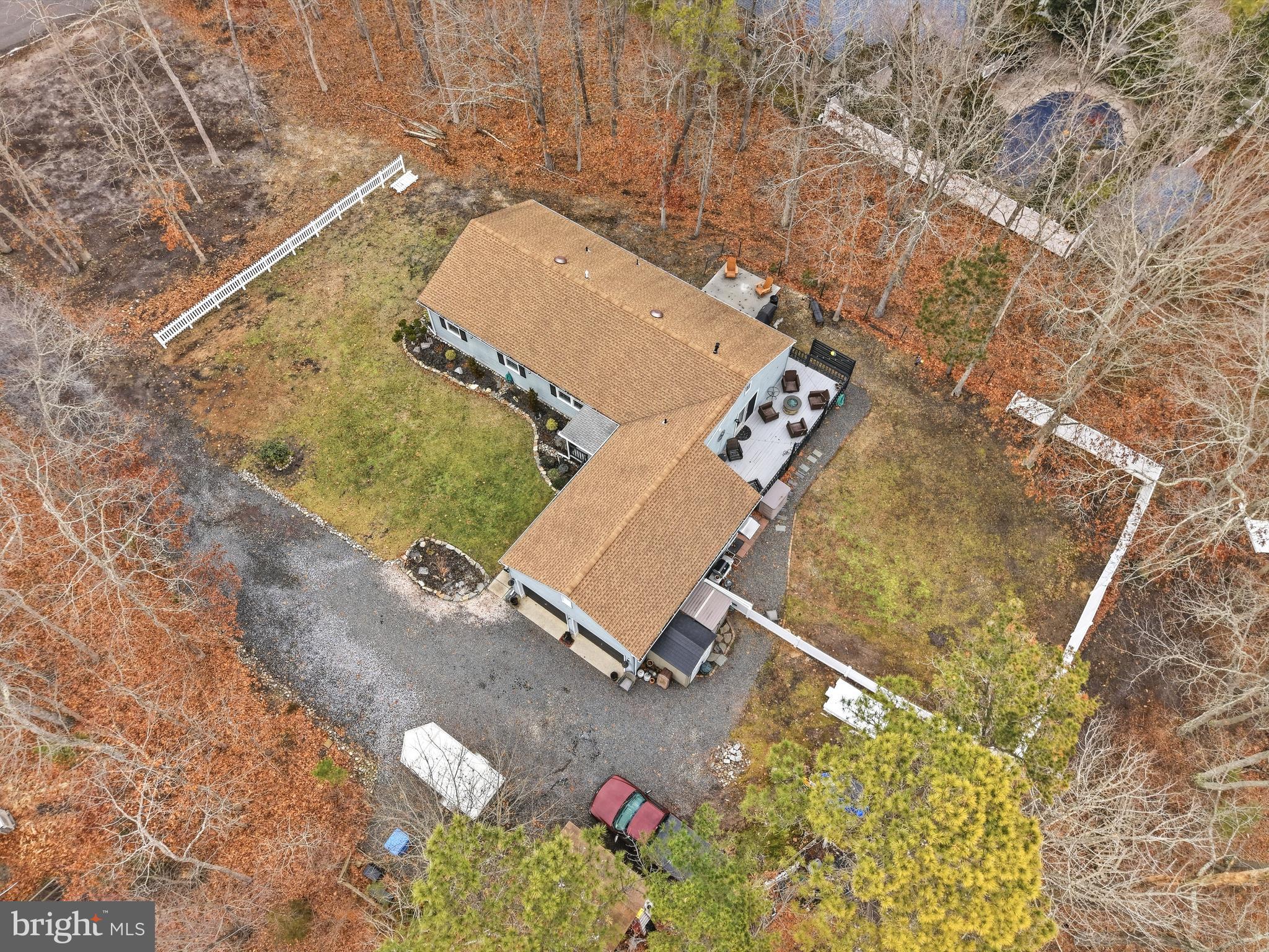 4 Prosit Lane Ocean View, NJ 08230 - Photo 6 of 29 an aerial view of a house with a yard and trees