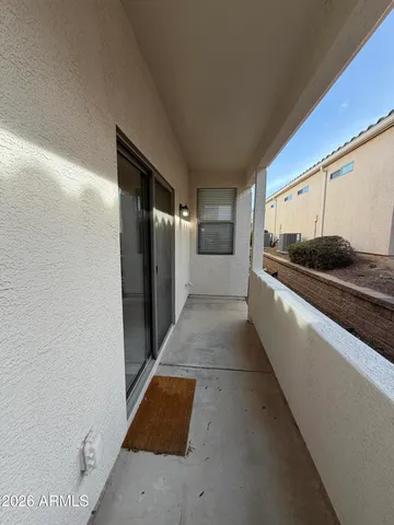 a kitchen with a refrigerator and a stove