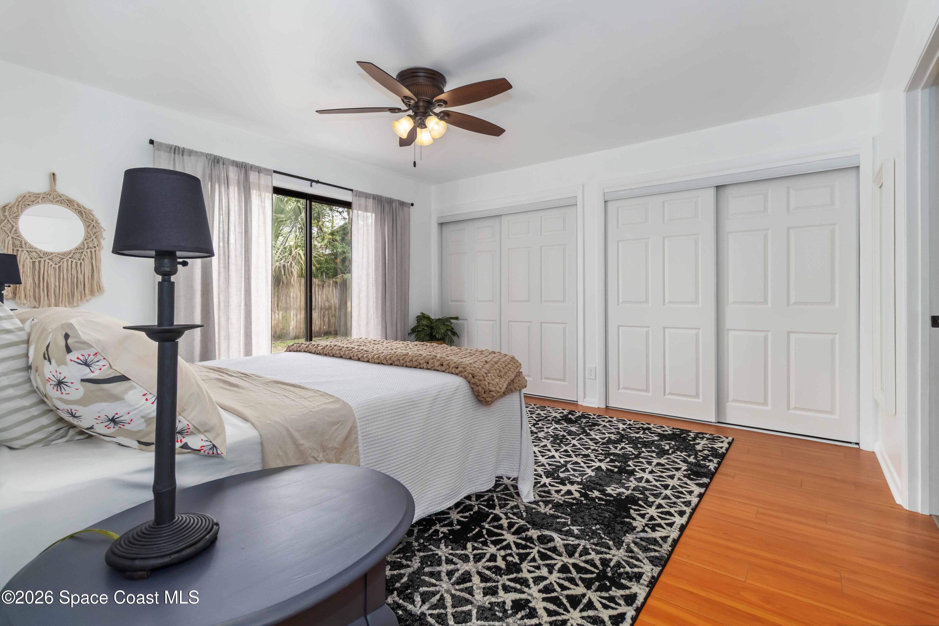 21 Branch Street Melbourne, FL 32901 - Photo 21 of 30 a bedroom with a bed and window