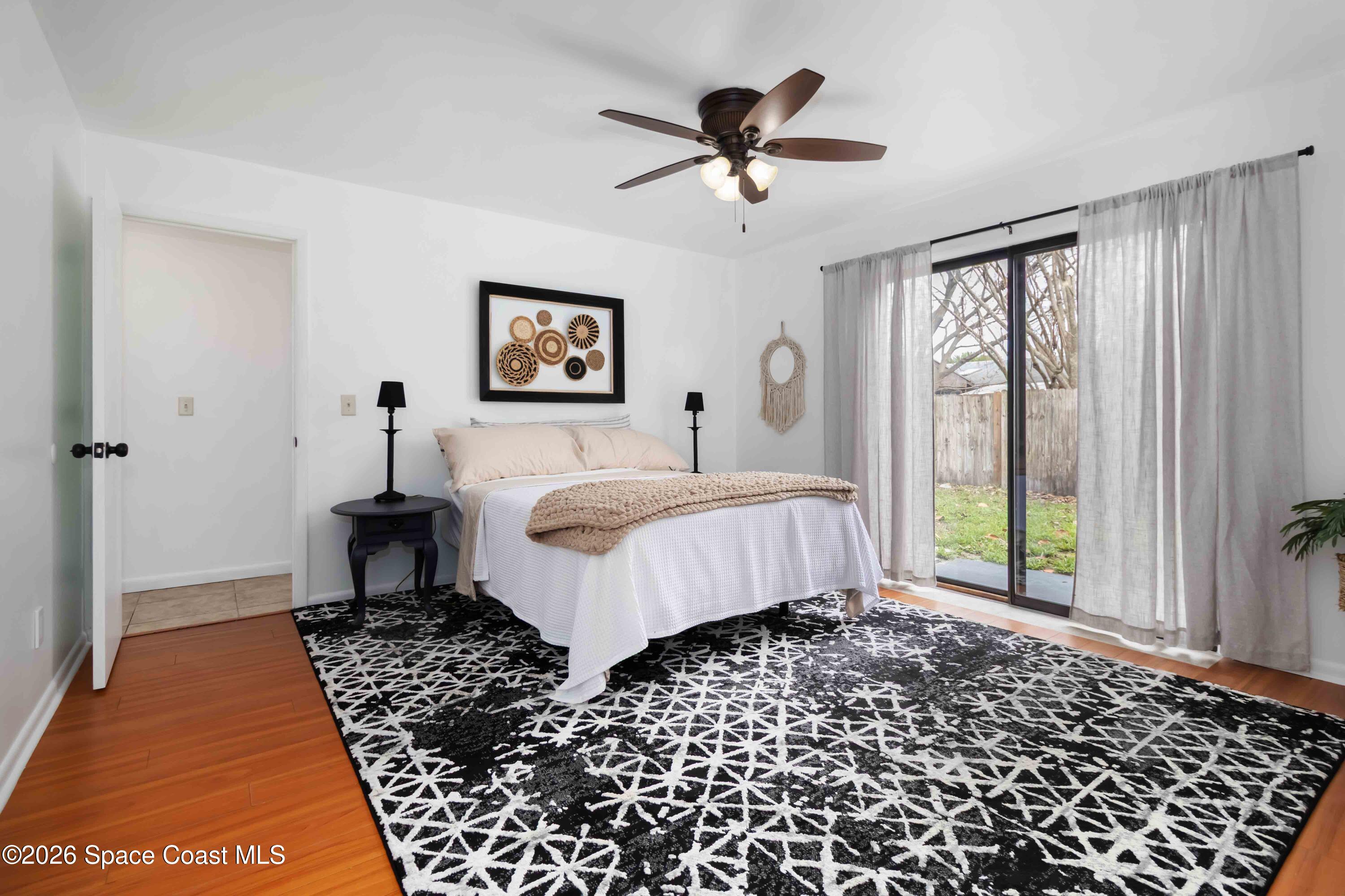 21 Branch Street Melbourne, FL 32901 - Photo 22 of 30 a bed room with a bed and a window