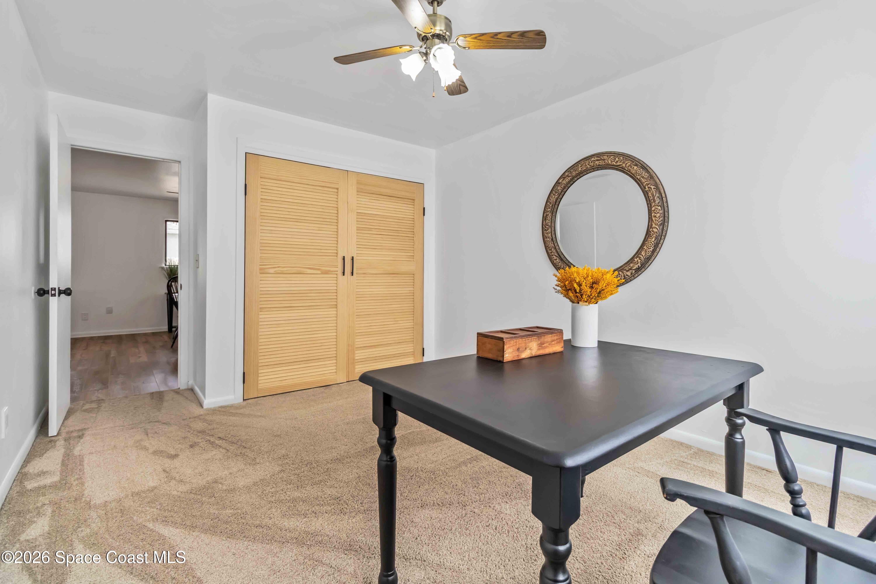 21 Branch Street Melbourne, FL 32901 - Photo 26 of 30 a workspace with furniture and a window