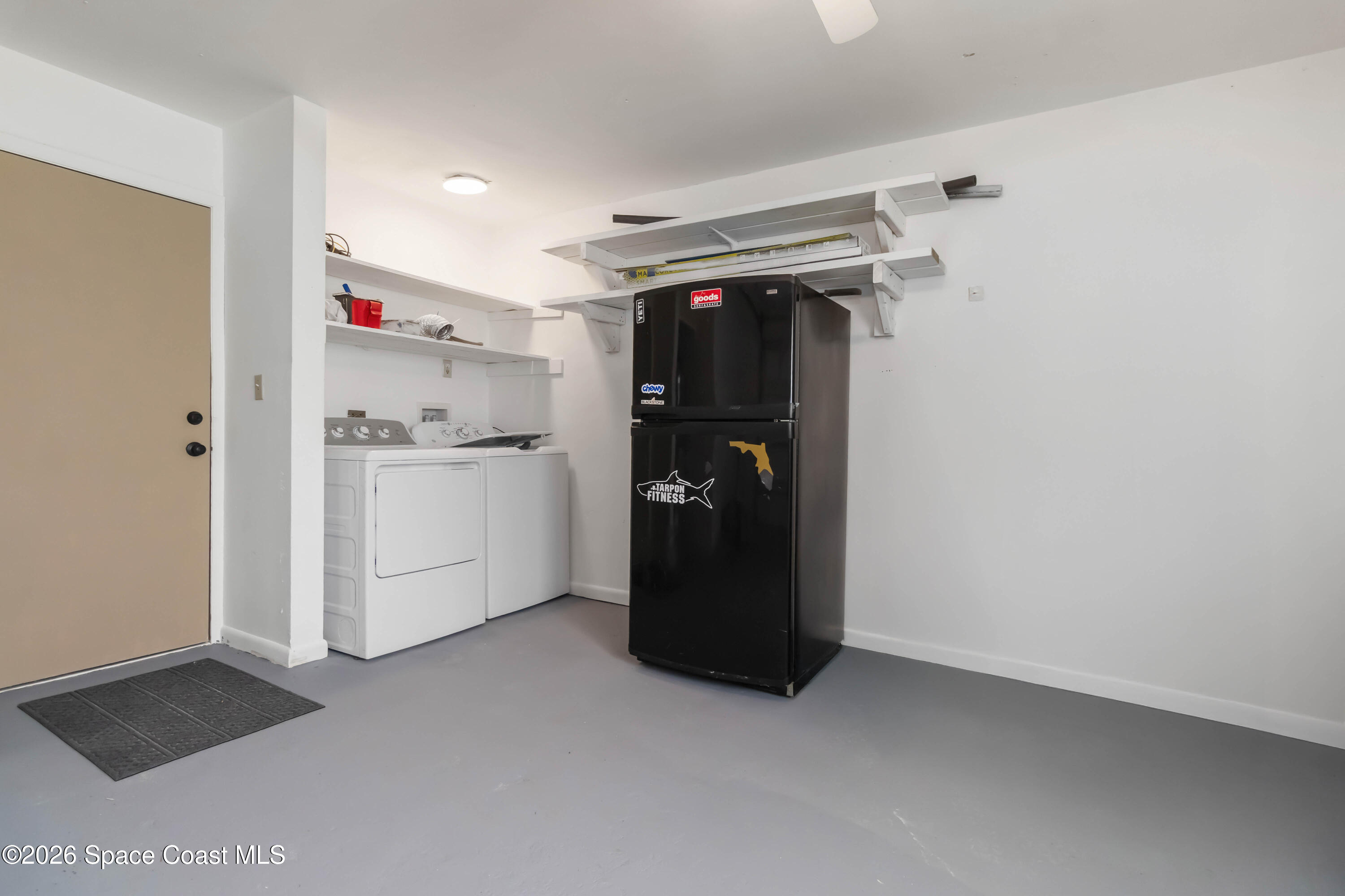 21 Branch Street Melbourne, FL 32901 - Photo 29 of 30 a view of kitchen and refrigerator