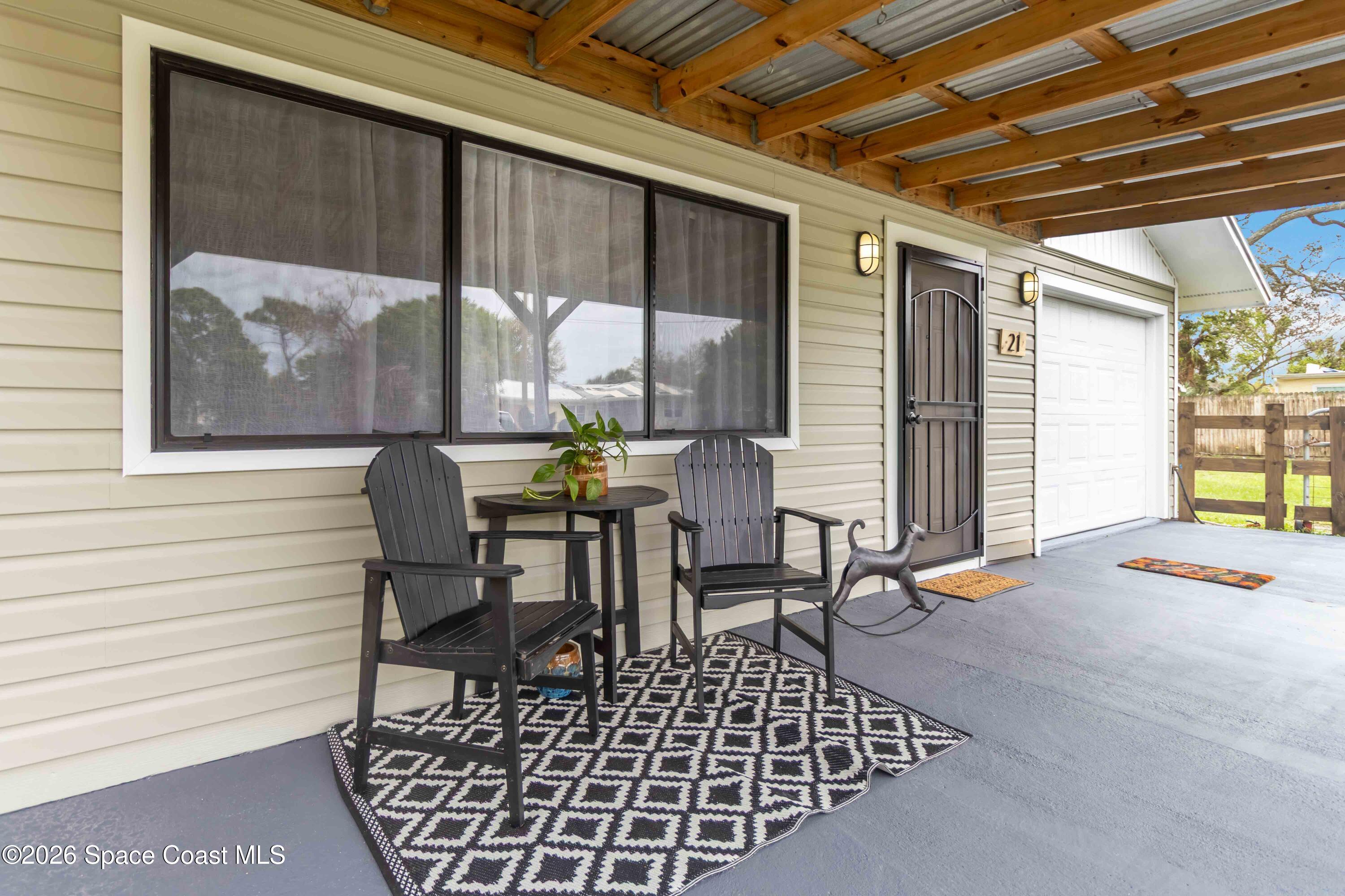 21 Branch Street Melbourne, FL 32901 - Photo 4 of 30 a view of a porch with furniture