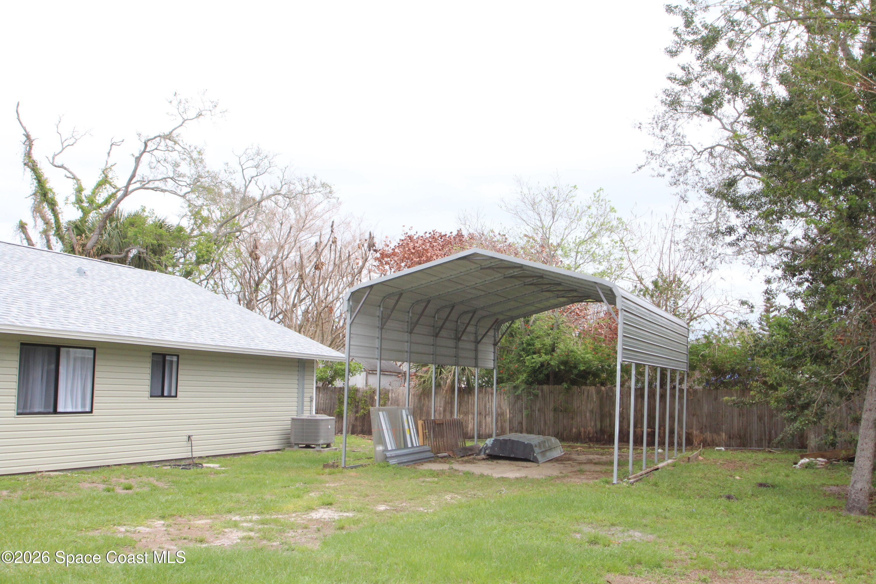 21 Branch Street Melbourne, FL 32901 - Photo 8 of 30 a house with garden in front of it