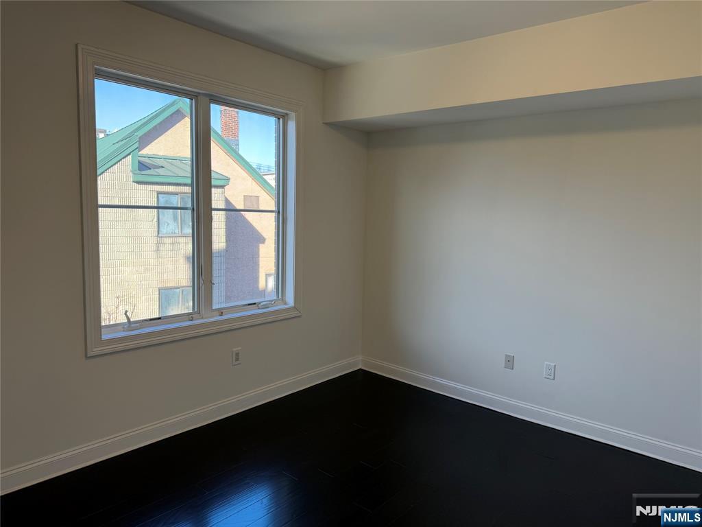 2001 Hudson Terrace, Unit 501 Fort Lee, NJ 07024 - Photo 15 of 23 an empty room with a window