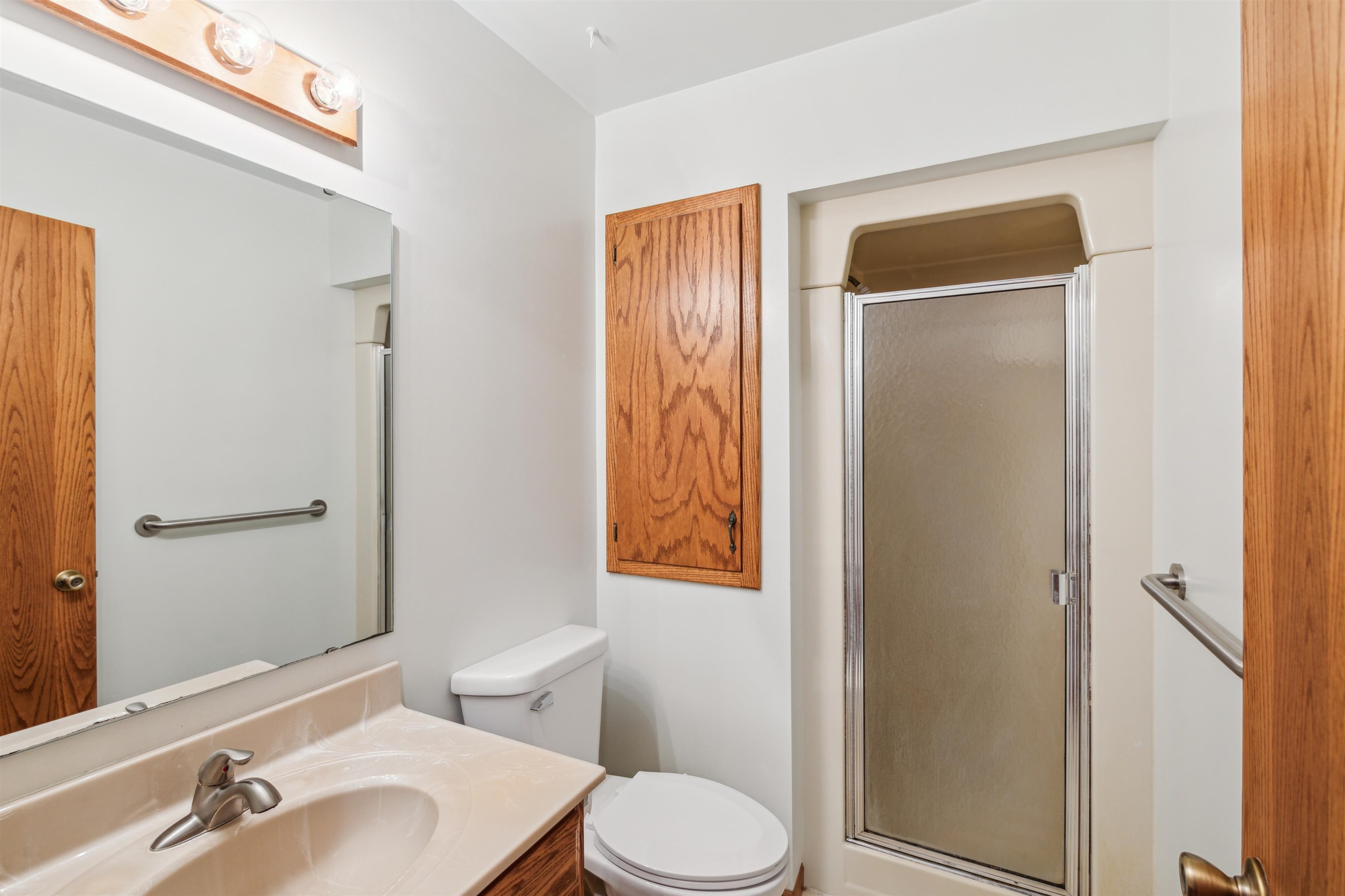 5948 Lavaque Road Duluth, MN 55803 - Photo 15 of 22 Full bathroom featuring vanity and a stall shower