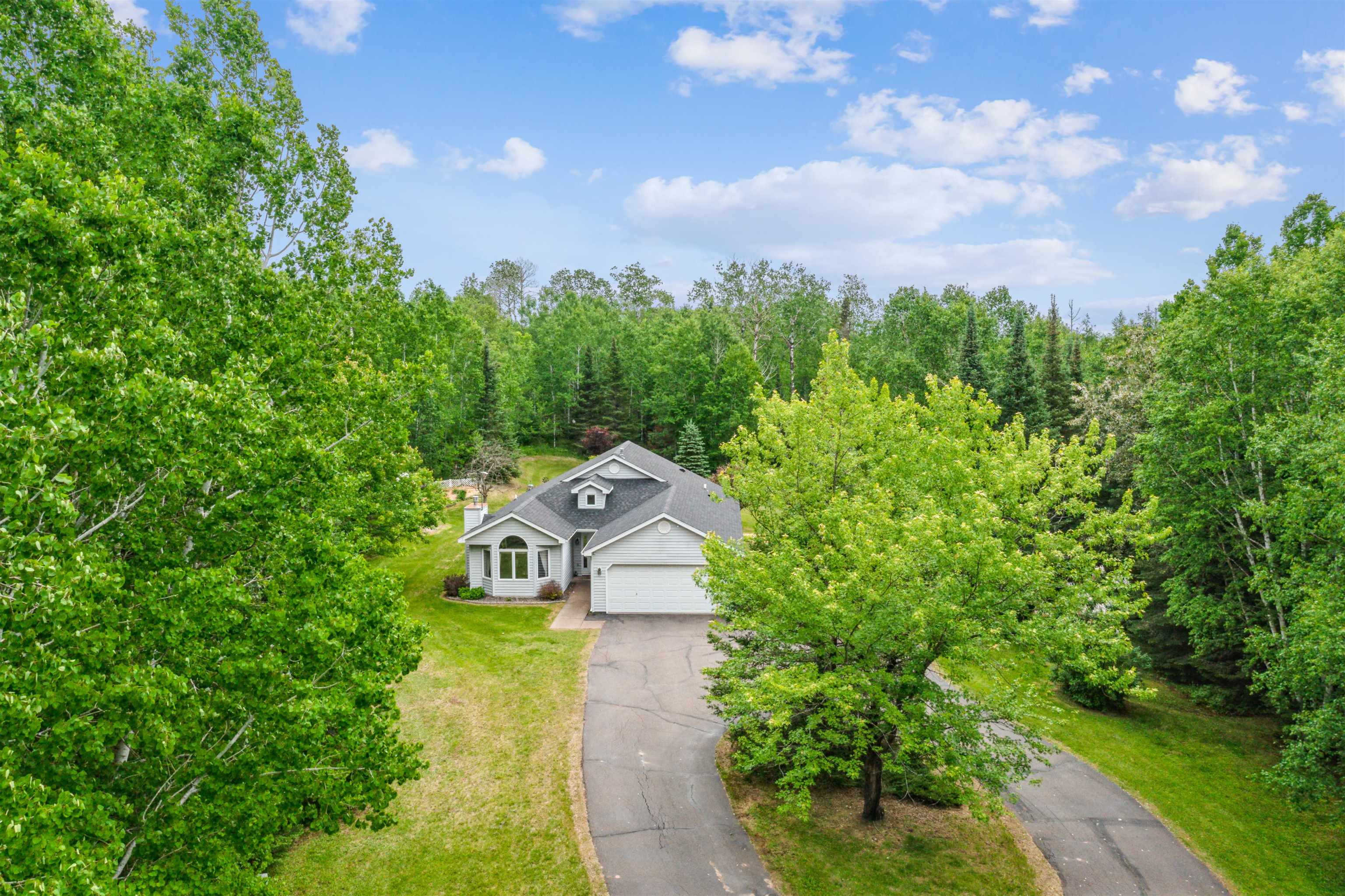 5948 Lavaque Road Duluth, MN 55803 - Photo 22 of 22 View of subject property featuring a forest