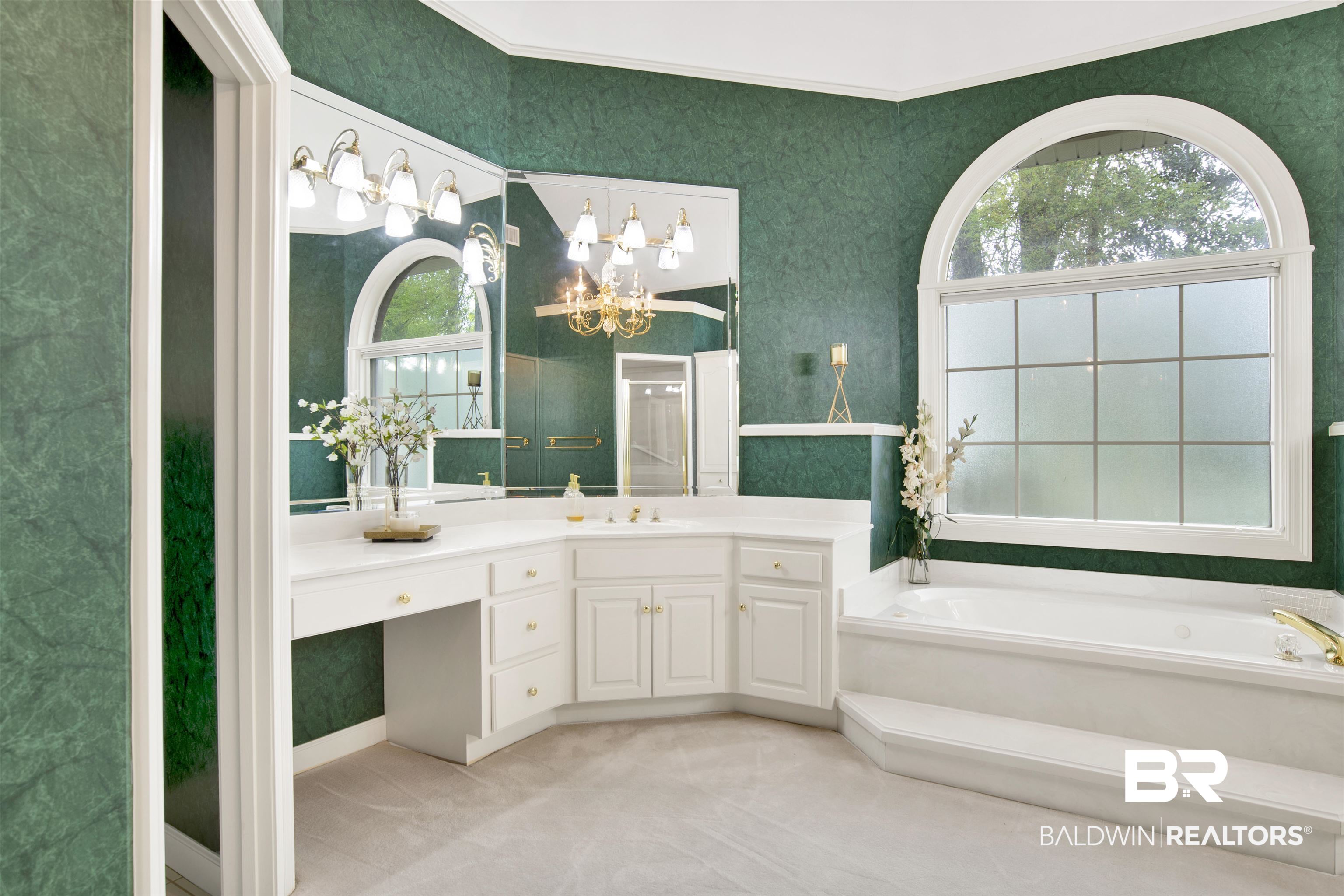 106 Old Mill Road Fairhope, AL 36532 - Photo 40 of 49 Full bath featuring vanity, wallpapered walls, a garden tub, and a notable chandelier