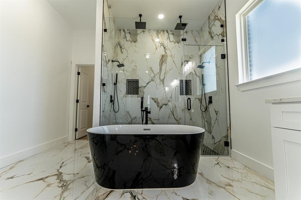 2147 Heath Street Sulphur Springs, TX 75482 - Photo 14 of 40 a bathroom with a sink and a mirror