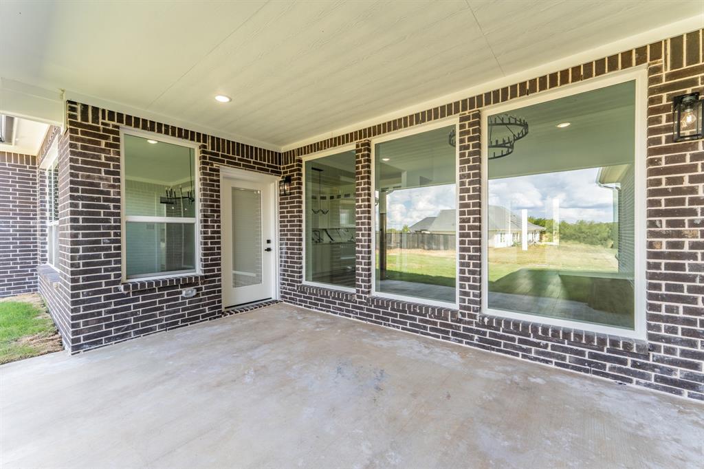 2147 Heath Street Sulphur Springs, TX 75482 - Photo 30 of 40 a view of outdoor space with sliding door