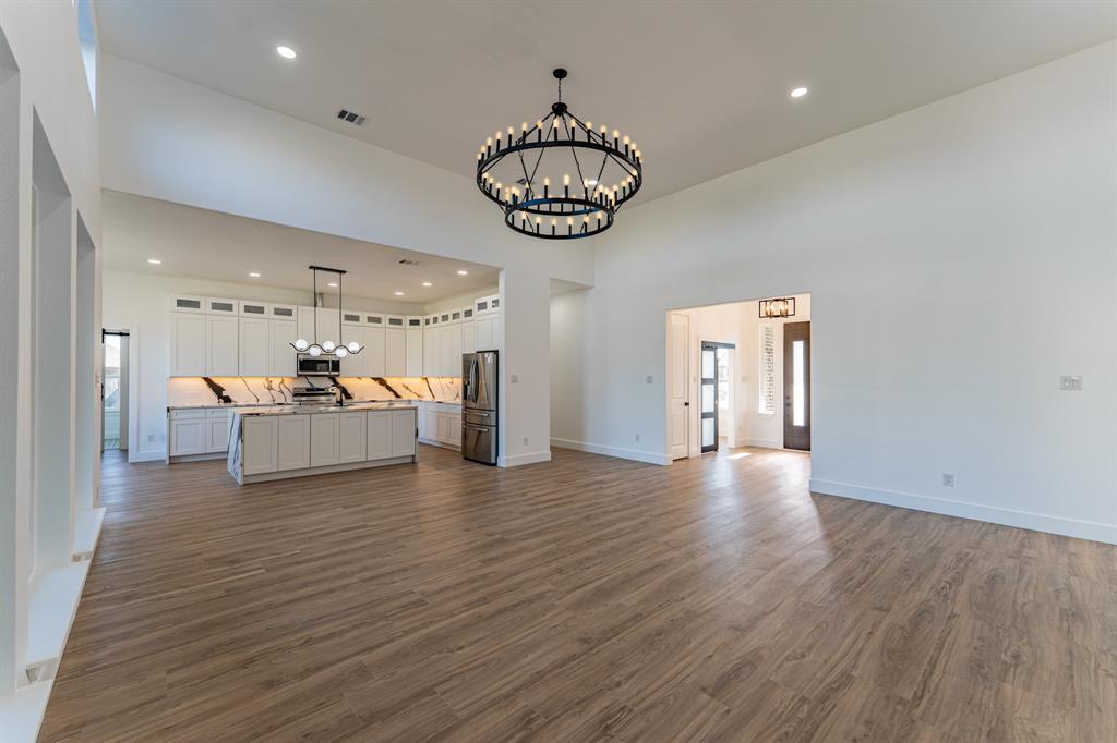2147 Heath Street Sulphur Springs, TX 75482 - Photo 3 of 40 a view of a livingroom with a furniture and wooden floor