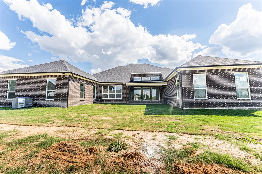 2147 Heath Street Sulphur Springs, TX 75482 - Photo 31 of 40 a front view of a house with a yard