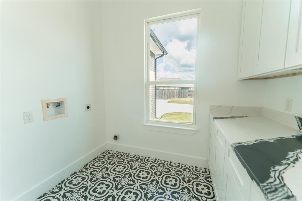 2147 Heath Street Sulphur Springs, TX 75482 - Photo 8 of 40 a view of an empty room and window