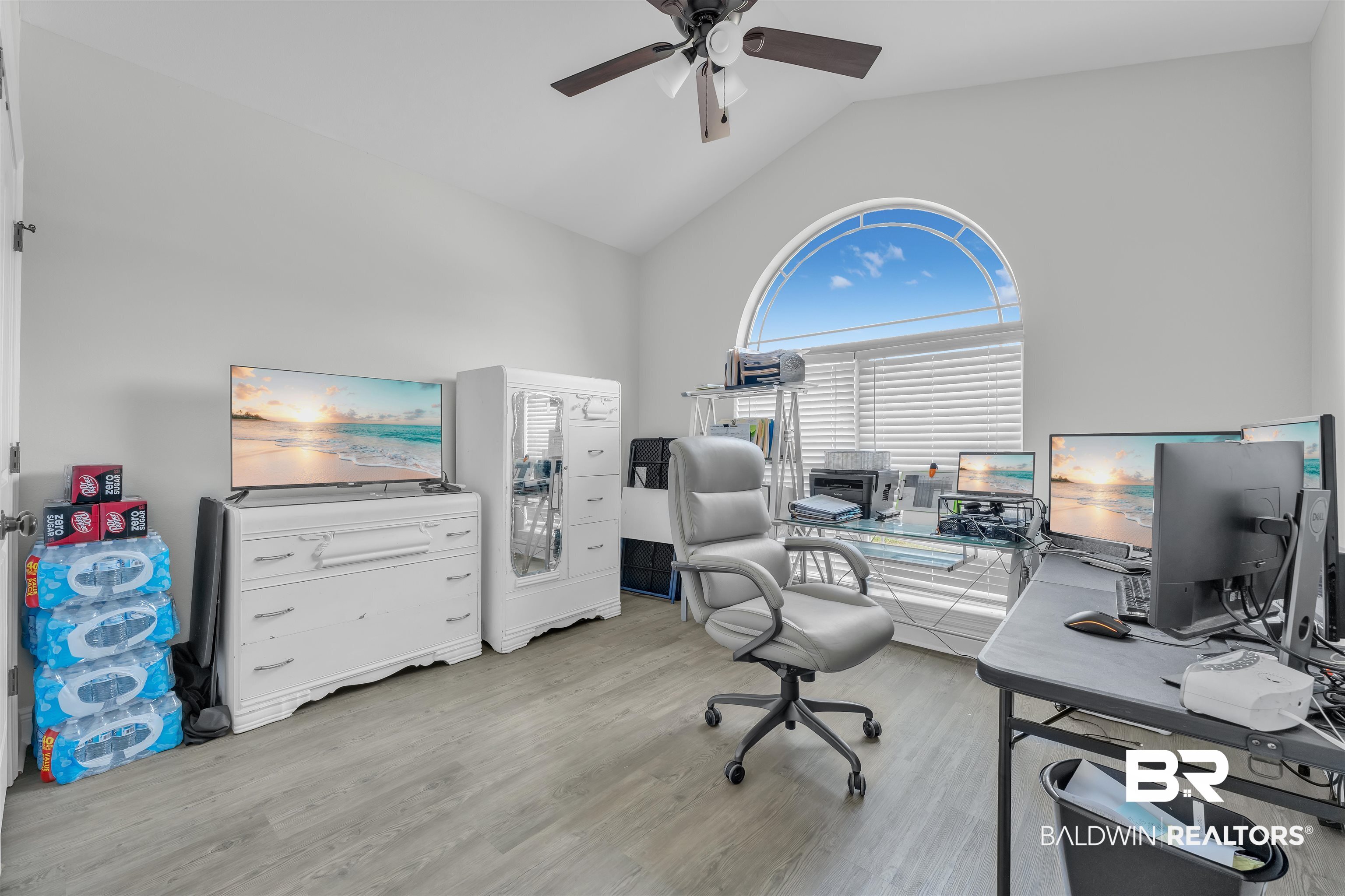 22565 Nana Loop East Silverhill, AL 36576 - Photo 14 of 26 Office area with ceiling fan, high vaulted ceiling, and wood finished floors
