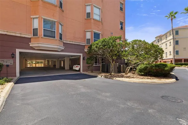front view of a building with potted plants