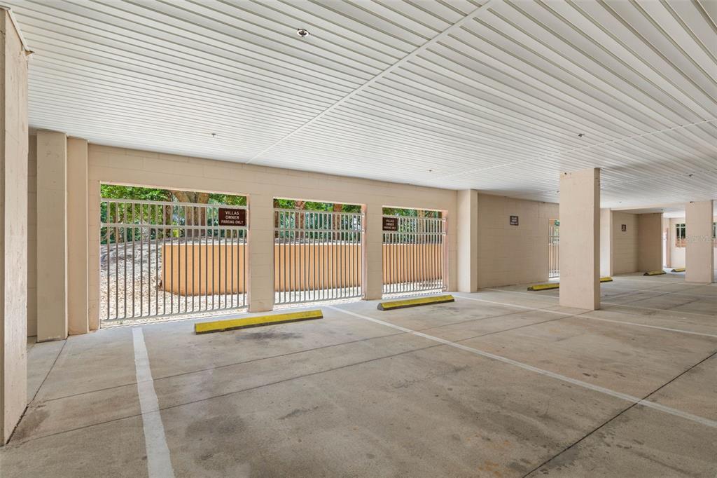 35 Ocean Crest Way, Unit 1124 Palm Coast, FL 32137 - Photo 31 of 81 a view of an empty room with wooden floor and fence