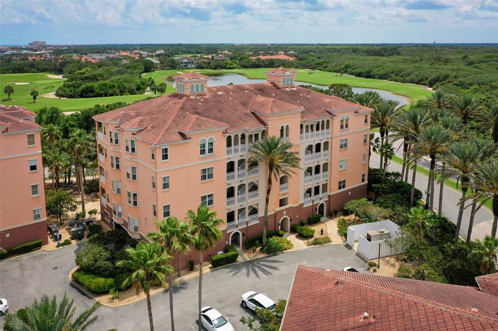 35 Ocean Crest Way, Unit 1124 Palm Coast, FL 32137 - Photo 38 of 81 an aerial view of a house