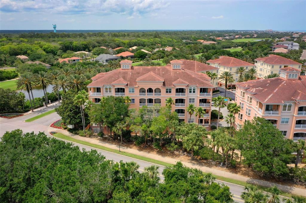 35 Ocean Crest Way, Unit 1124 Palm Coast, FL 32137 - Photo 40 of 81 an aerial view of multiple house