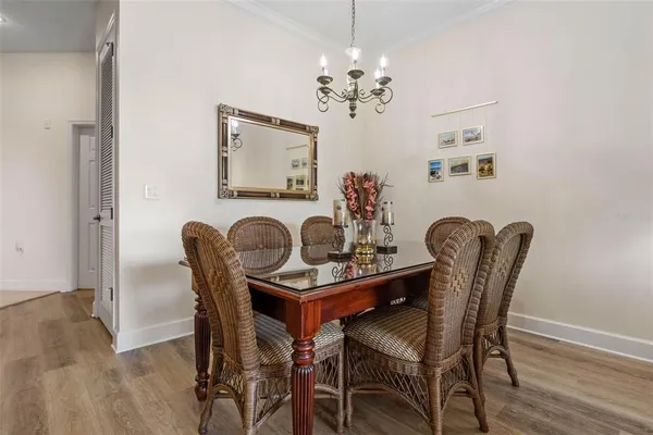 a kitchen with stainless steel appliances granite countertop a refrigerator stove and sink