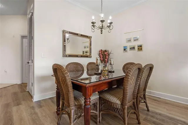 a kitchen with stainless steel appliances granite countertop a refrigerator stove and sink