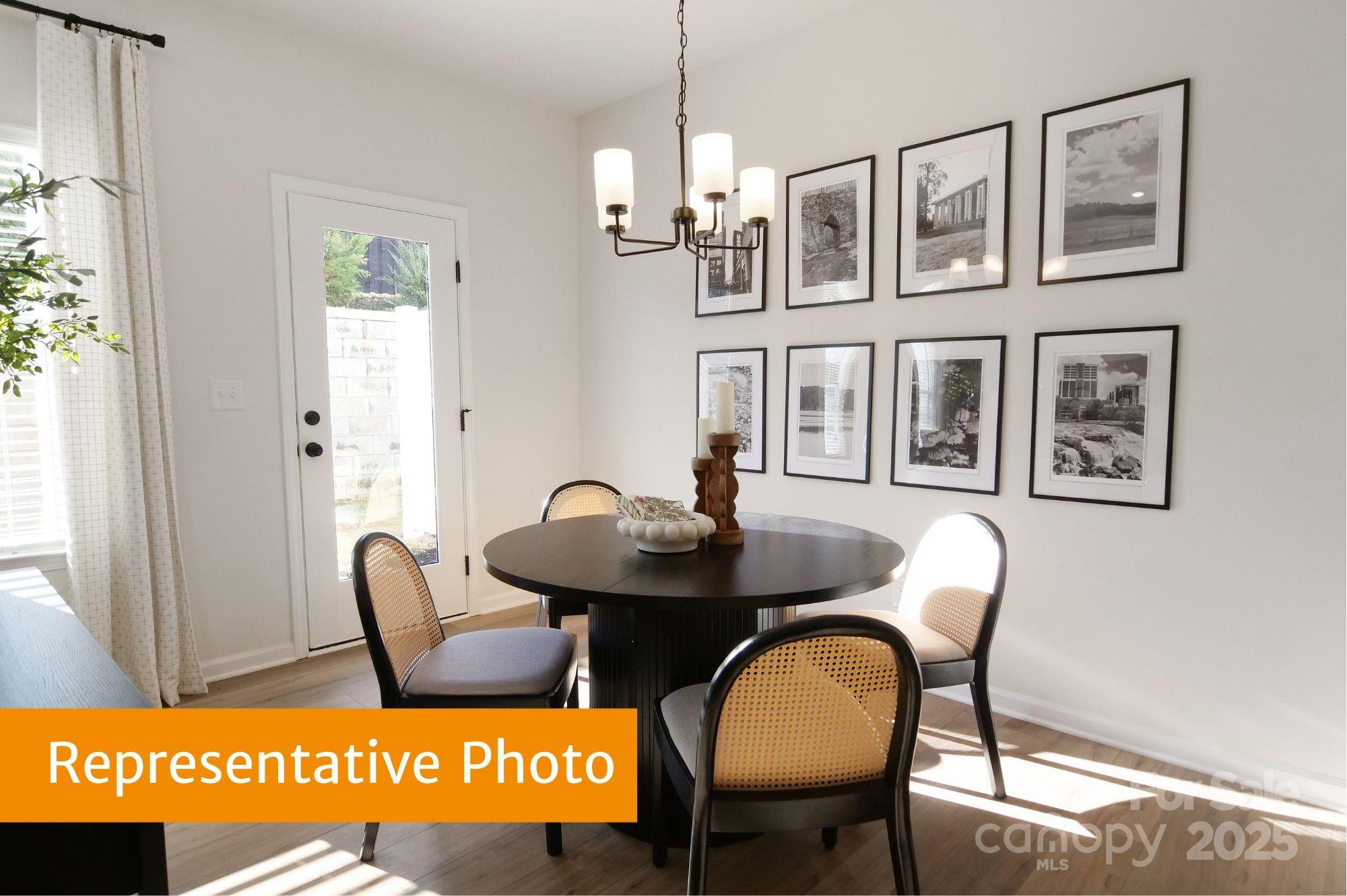 5620 Ringneck Road Charlotte, NC 28216 - Photo 11 of 24 a view of a dining room with furniture