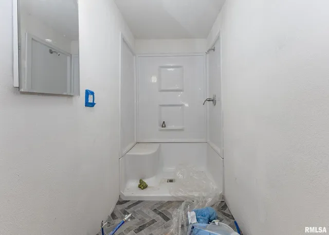 a bathroom with a bathtub