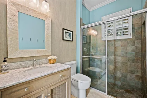 a view of a livingroom with furniture and staircase