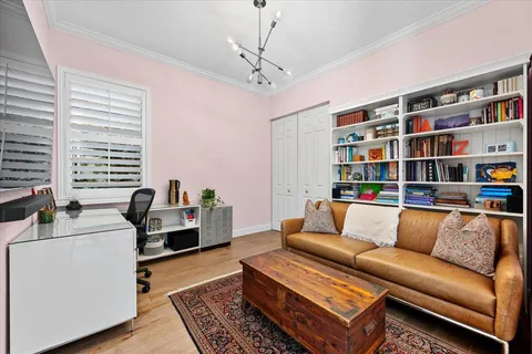 a view of a balcony with a yard