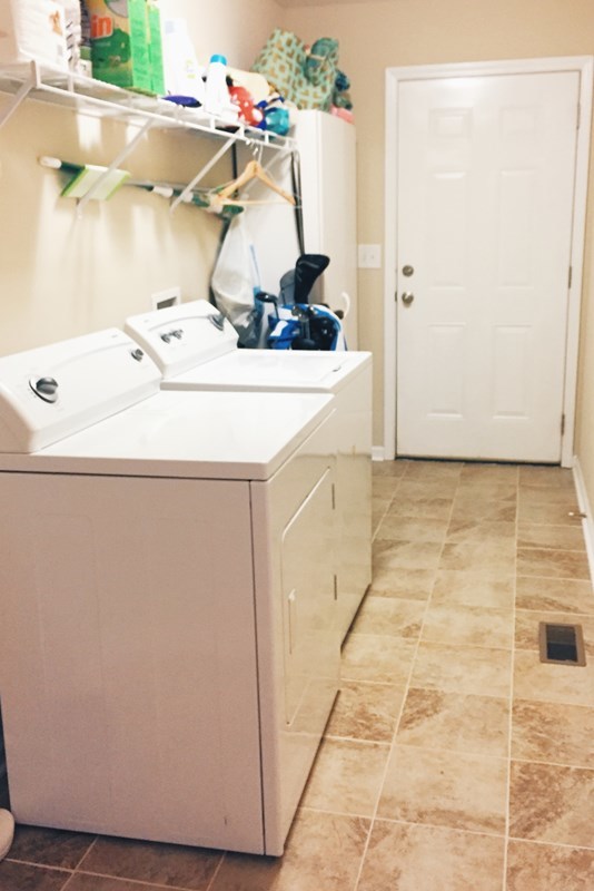 232 Sanders Road Macon, GA 31210 - Photo 22 of 33 a bathroom with a sink and a mirror