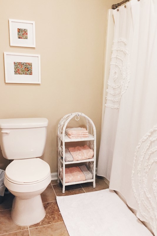 232 Sanders Road Macon, GA 31210 - Photo 25 of 33 a white toilet sitting next to a white sink