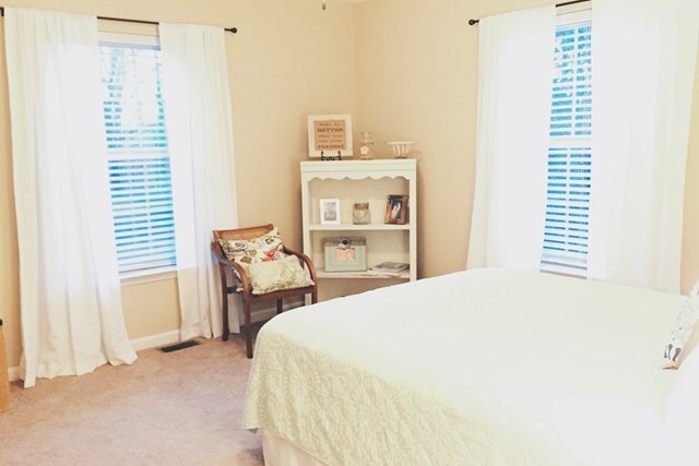 232 Sanders Road Macon, GA 31210 - Photo 27 of 33 a bedroom with a bed and a window