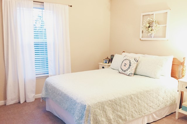 232 Sanders Road Macon, GA 31210 - Photo 28 of 33 a bedroom with a bed and a window