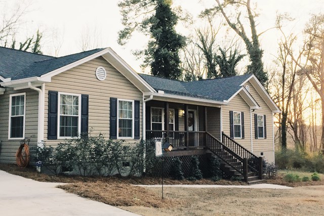 232 Sanders Road Macon, GA 31210 - Photo 8 of 33 a front view of a house with garden