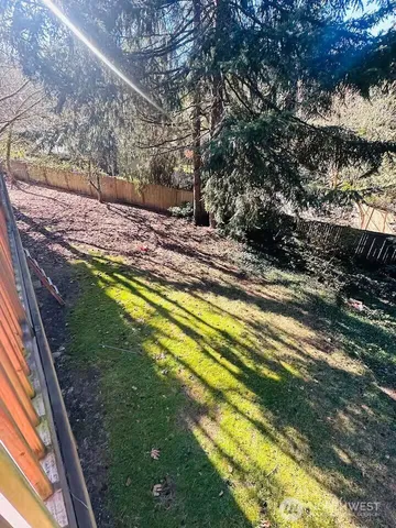 a view of a yard with an outdoor space