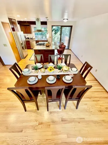 a view of a dining room with furniture window and outside view