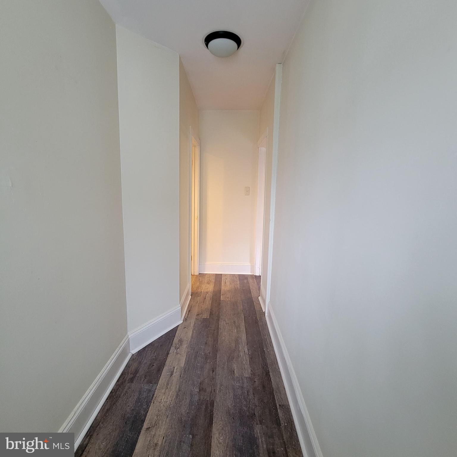 127 2nd Avenue Pitman, NJ 08071 - Photo 12 of 36 a view of a hallway with wooden floor