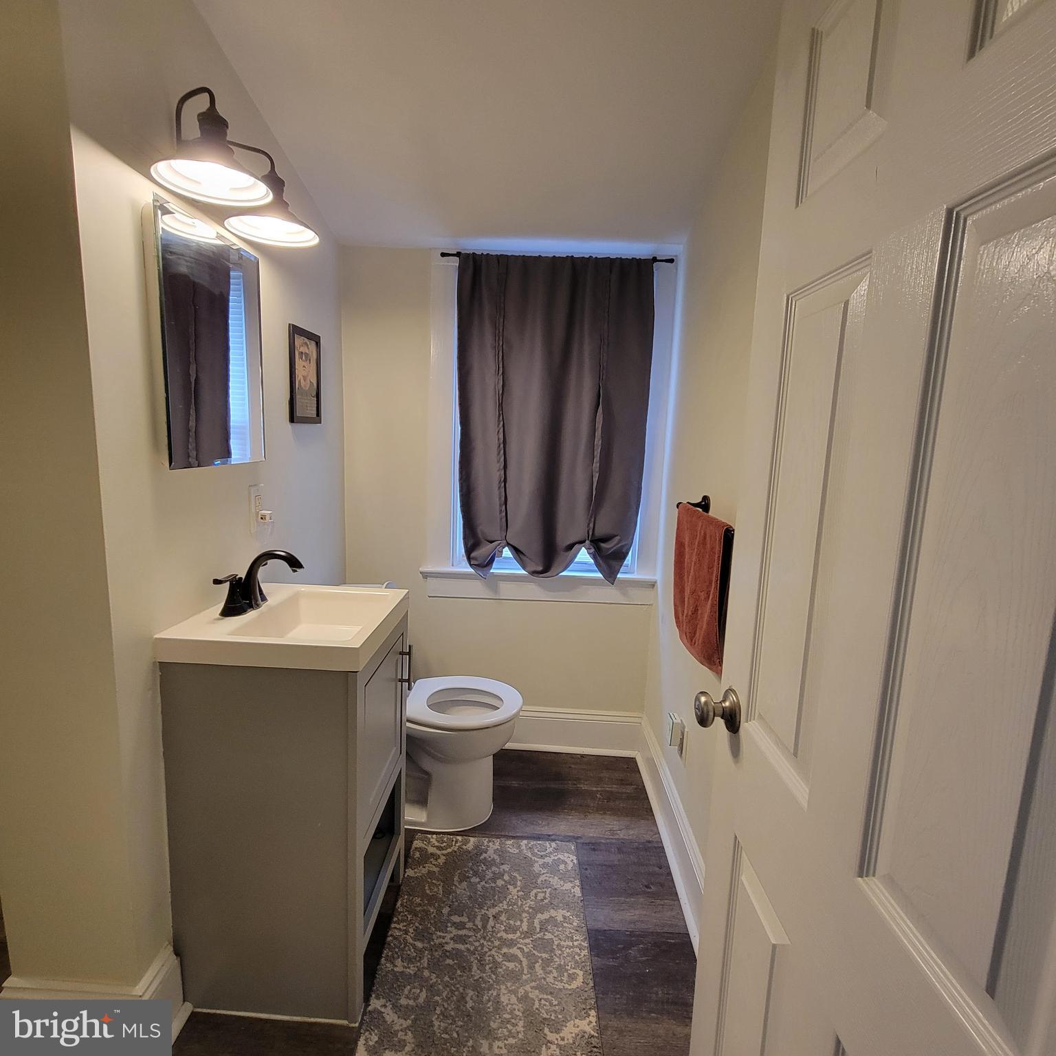 127 2nd Avenue Pitman, NJ 08071 - Photo 15 of 36 a bathroom with a sink toilet and shower