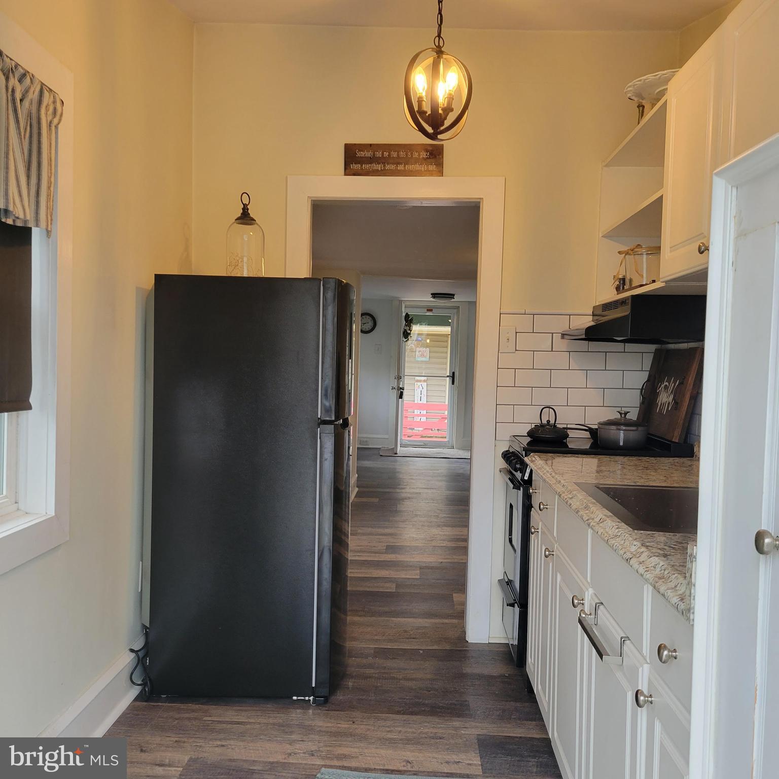 127 2nd Avenue Pitman, NJ 08071 - Photo 19 of 36 a kitchen with stainless steel appliances granite countertop a refrigerator and a sink