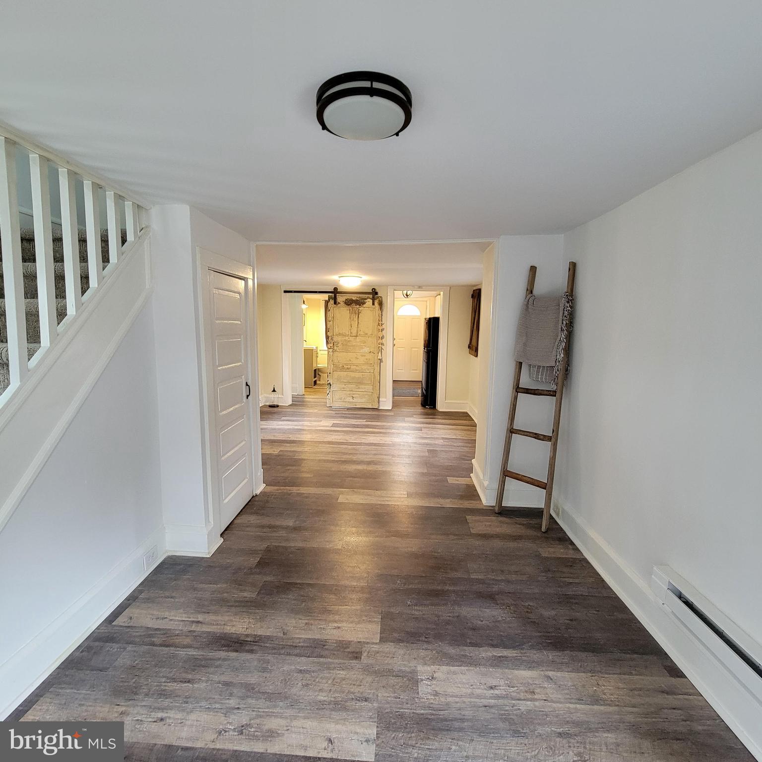 127 2nd Avenue Pitman, NJ 08071 - Photo 5 of 36 a view of an entryway with wooden floor