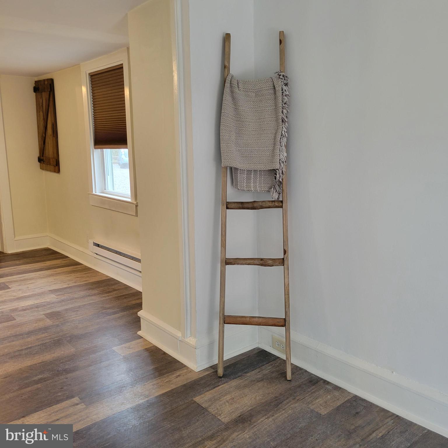 127 2nd Avenue Pitman, NJ 08071 - Photo 8 of 36 a view of a room with wooden floor and cabinet