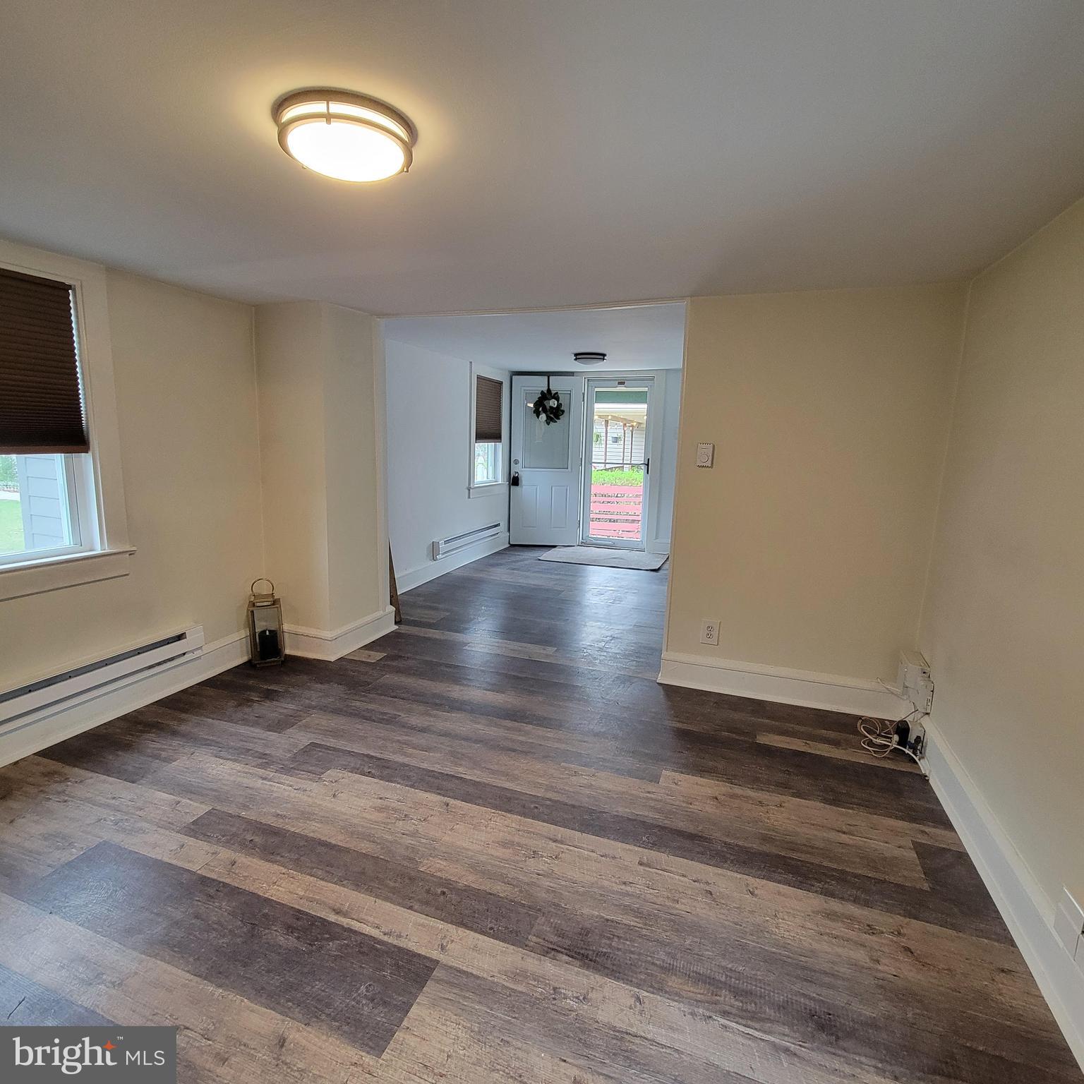 127 2nd Avenue Pitman, NJ 08071 - Photo 9 of 36 wooden floor in an empty room with a window