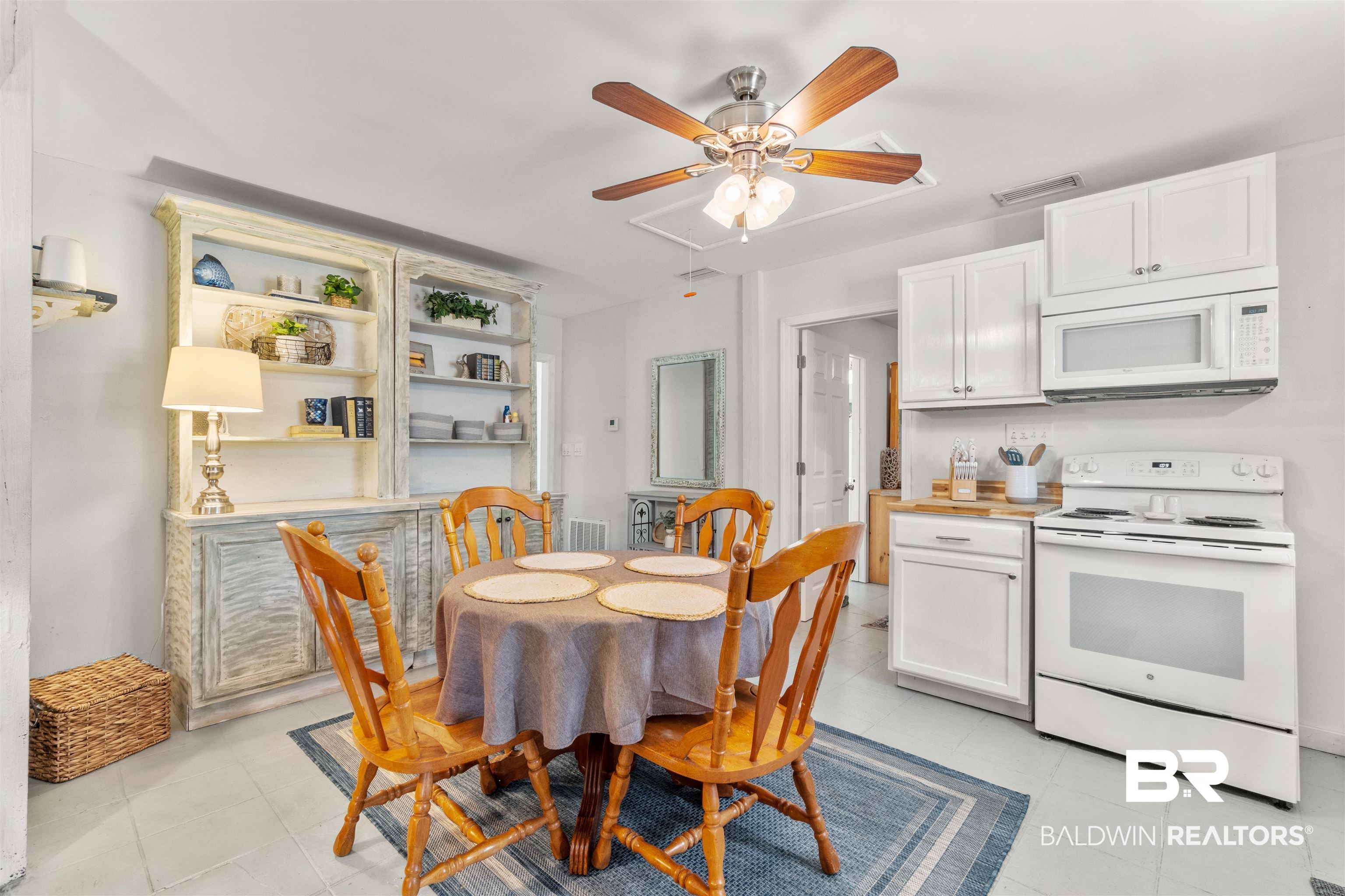 17595 River Road Summerdale, AL 36580 - Photo 6 of 29 Dining space with ceiling fan and light tile patterned floors