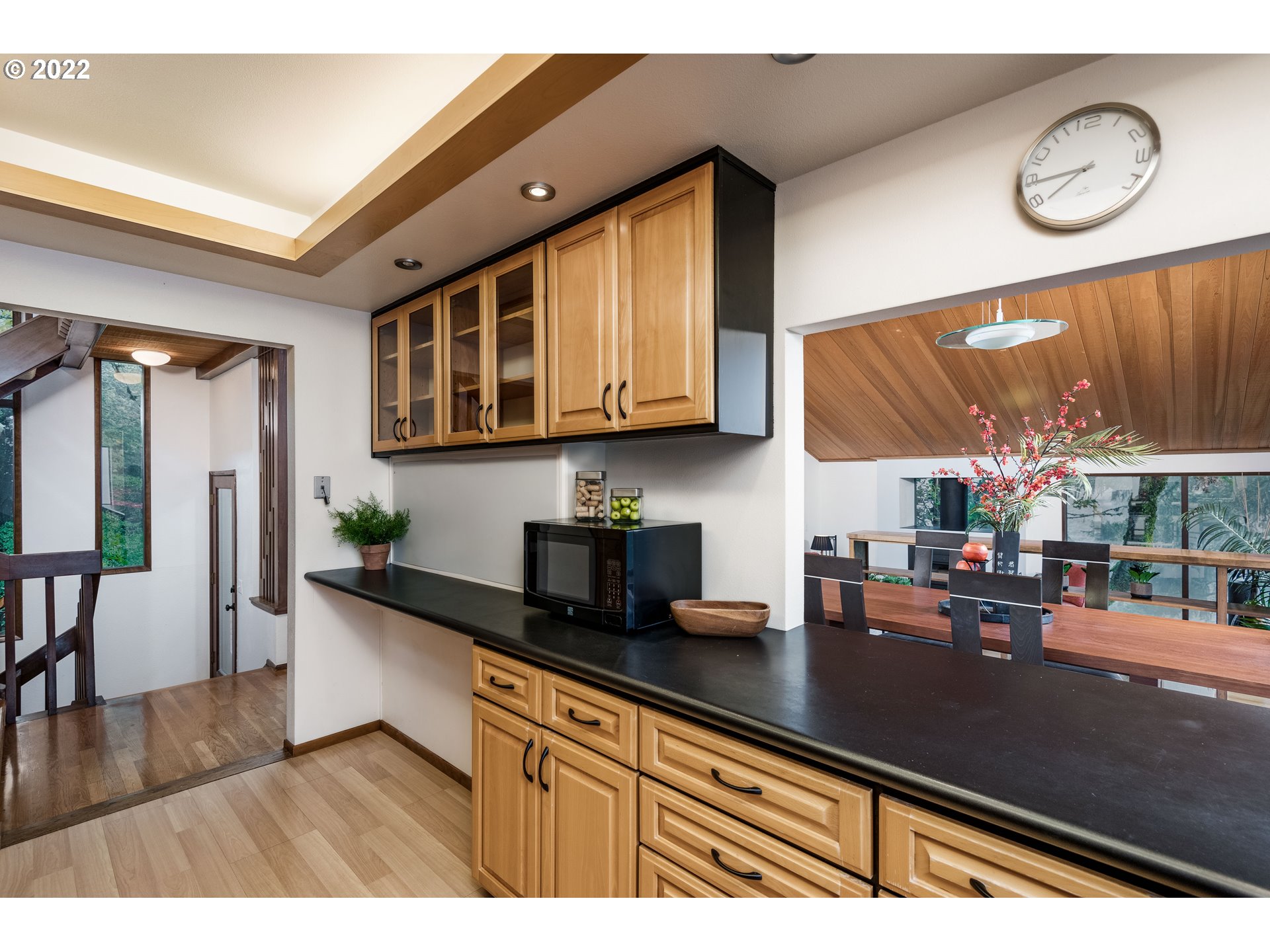 635 Startouch Drive Eugene, OR 97405 - Photo 11 of 28 a kitchen with stainless steel appliances granite countertop a stove a sink dishwasher and cabinets with wooden floor