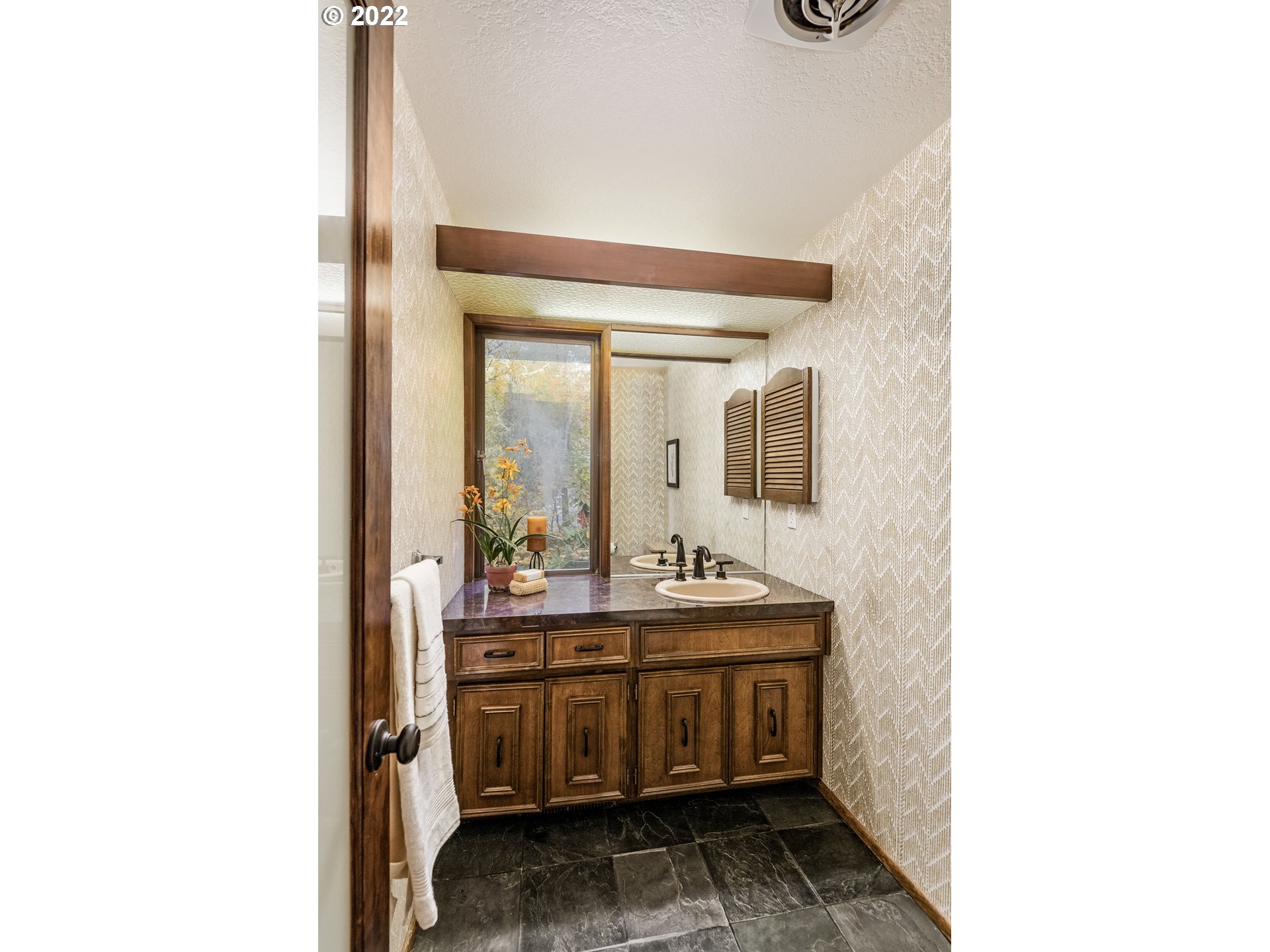 635 Startouch Drive Eugene, OR 97405 - Photo 15 of 28 a bathroom with a sink and a mirror