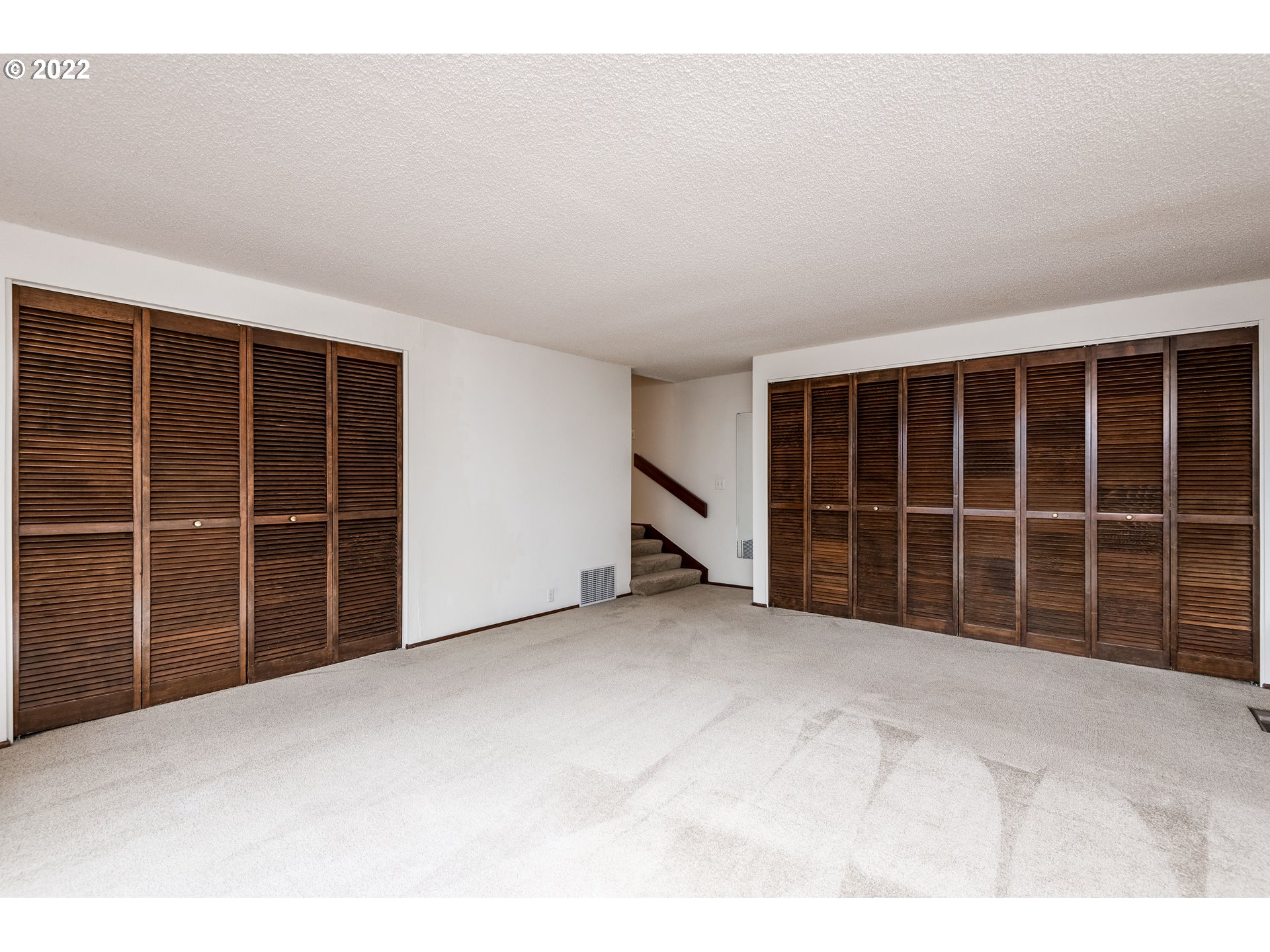 635 Startouch Drive Eugene, OR 97405 - Photo 16 of 28 a view of an empty room with a large window