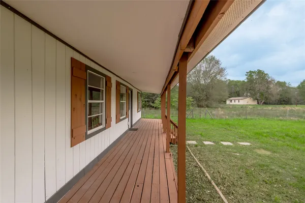 a view of backyard with green space