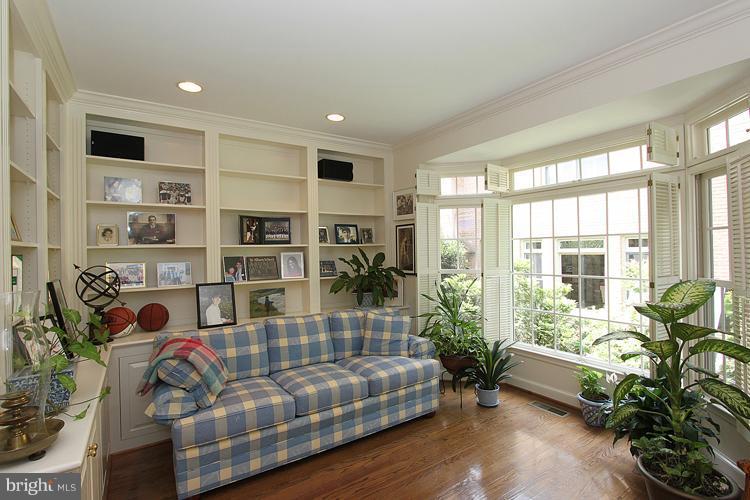 5119 Warren Place Northwest Washington, DC 20016 - Photo 11 of 30 a living room with furniture and a floor to ceiling window